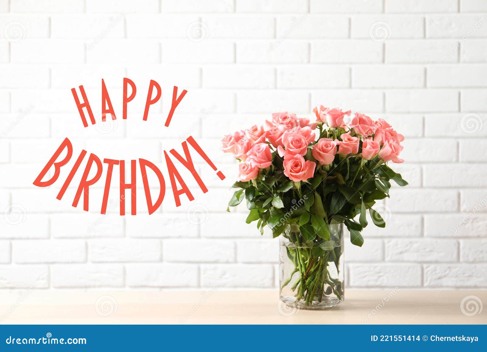 Happy Birthday! Vase with beautiful rose flowers on table near white brick  wall Stock Photo - Alamy