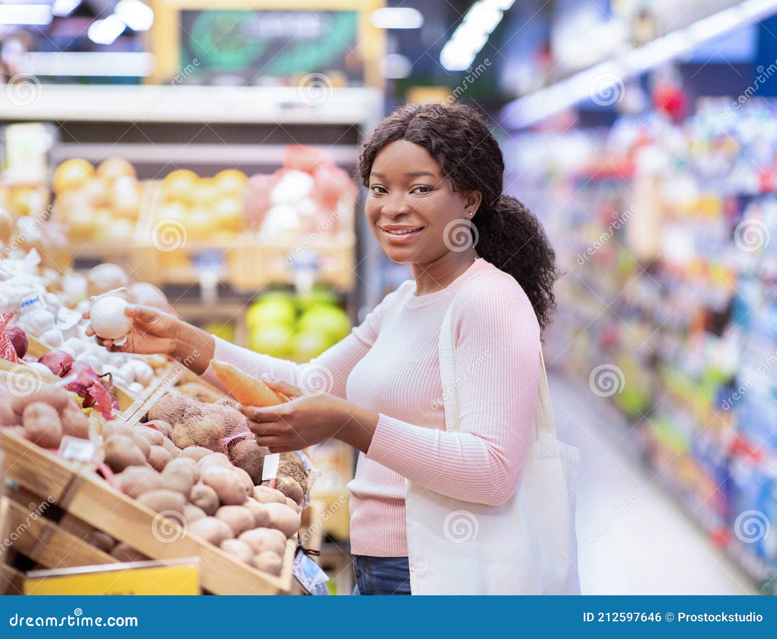 Happy Black Lady Choosing Vegetables at Grocery Store or Supermarket ...