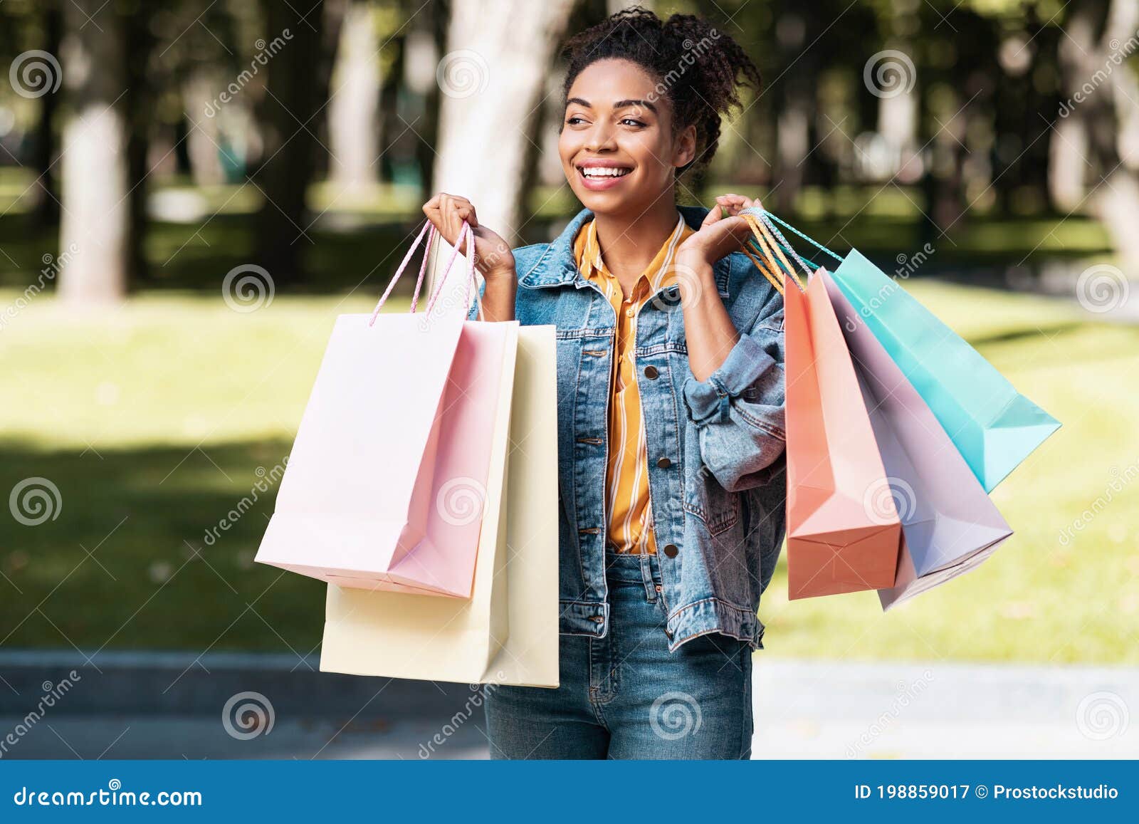 Happy Black Lady Doing Shopping Carrying Shopper Bags Walking Outdoors ...