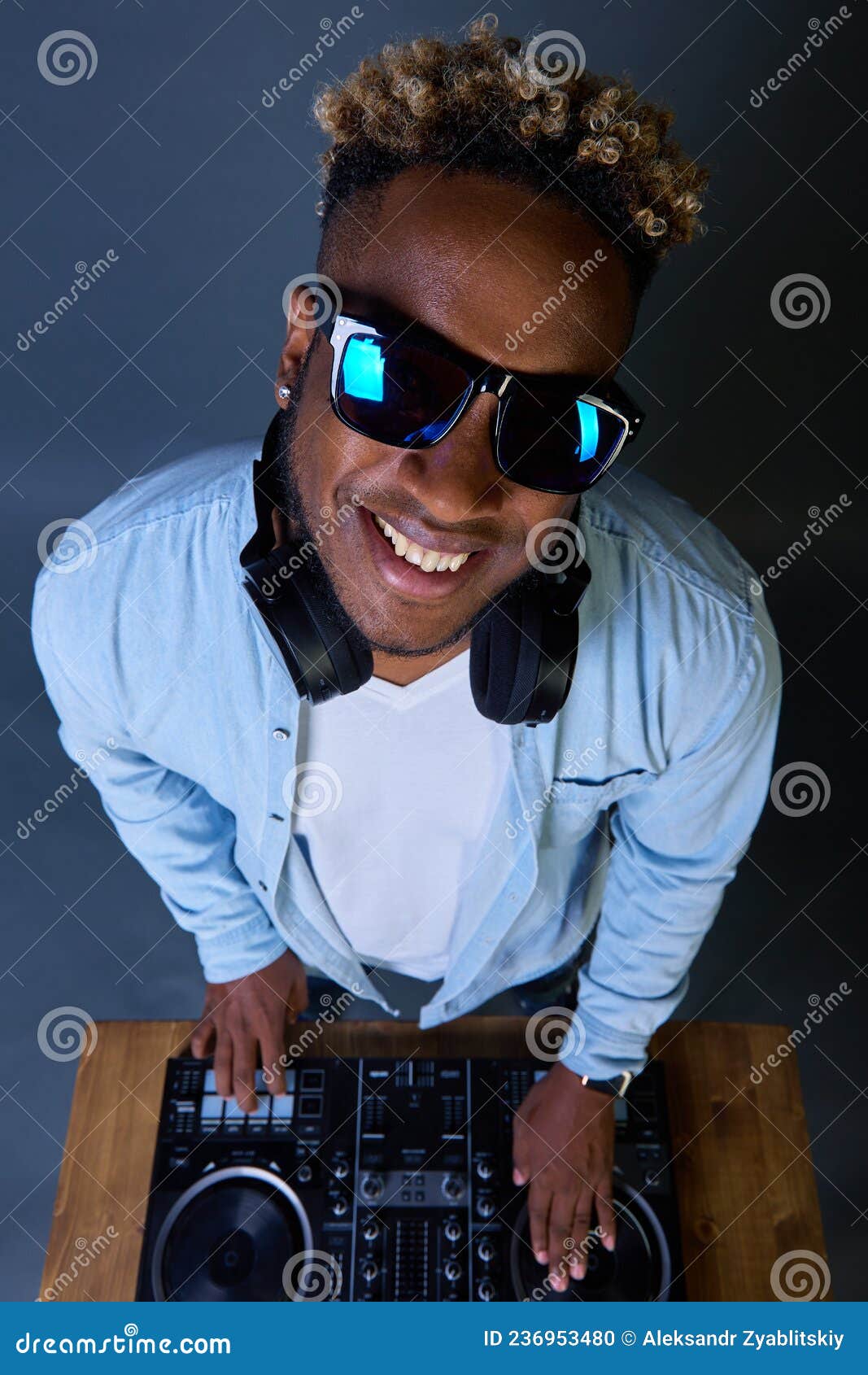 Happy African-American DJ with an Afro Hairstyle Plays Music with Sunglasses. Stock Photo - Image of model, active: 236953480 Happy African-American DJ with an Afro Hairstyle Plays Music with Sunglasses. Stock Photo - Image of model, active: 236953480