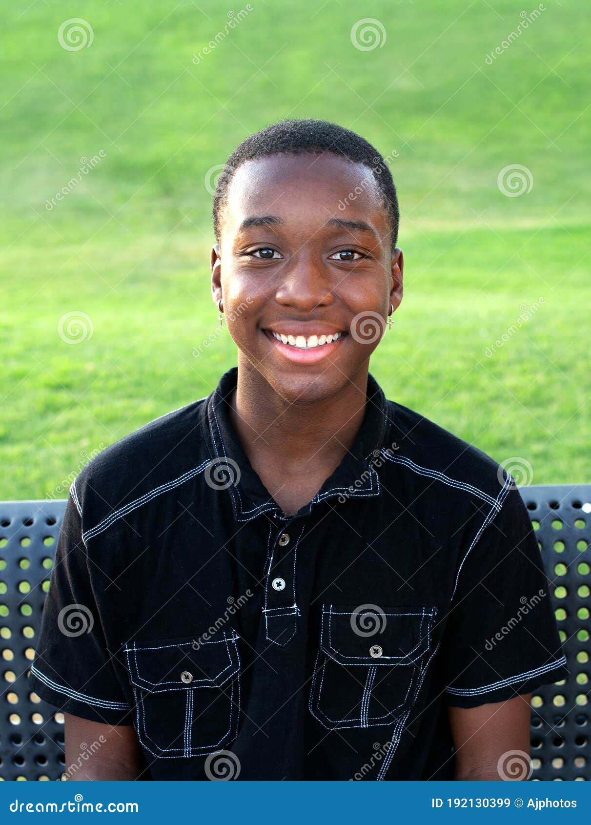 happy black teen boy outside