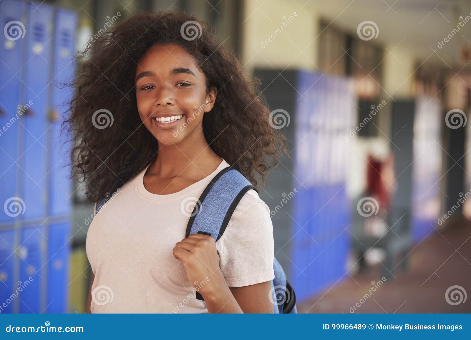 Happy Black Teenage Girl Smiling in High School Corridor Stock Image -  Image of schoolgirl, black: 99966489