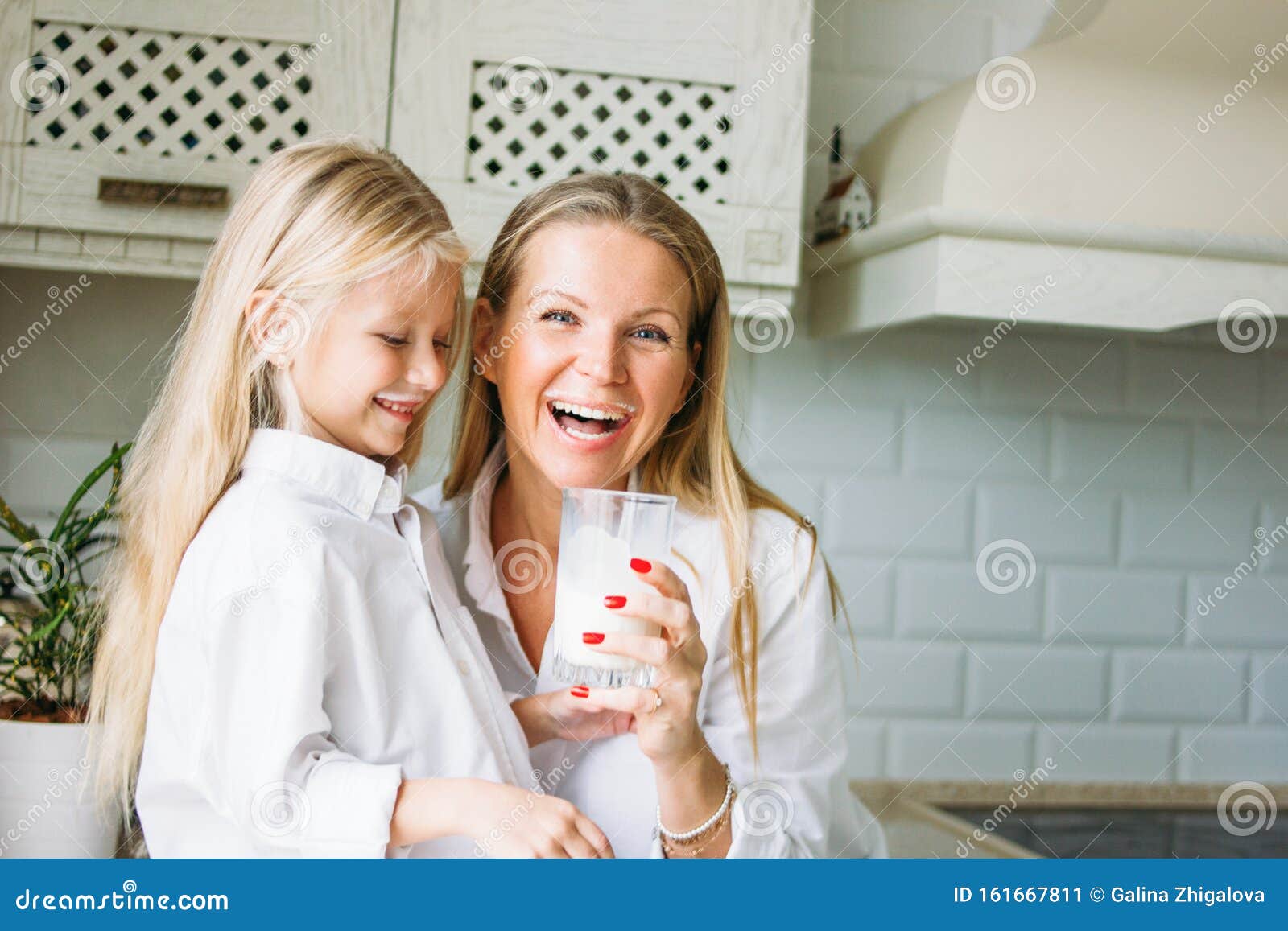 Happy Blonde Long Hair Mom and Daughter Drinking Milk in Kitchen, Healthy Lifestyle Stock Image - Image of daughter, girl: 161667811 Happy Blonde Long Hair Mom and Daughter Drinking Milk in Kitchen, Healthy Lifestyle Stock Image - Image of daughter, girl: 161667811