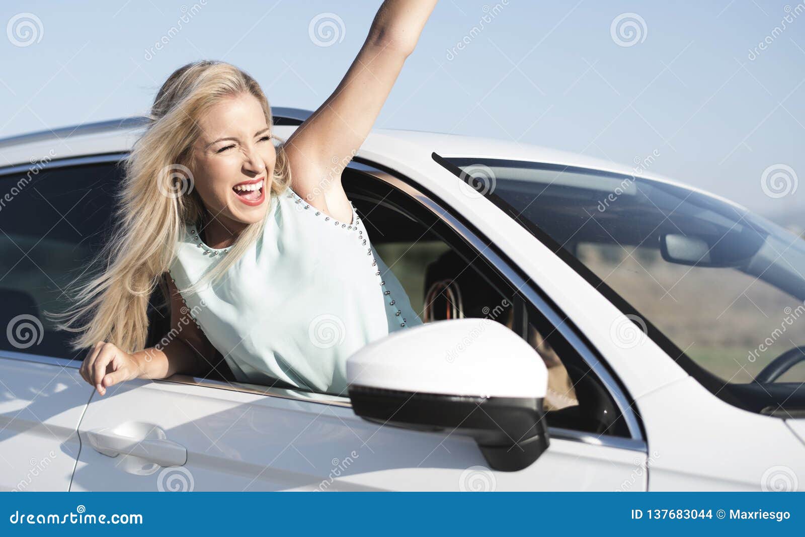 Happy Blonde Woman On Car Stock Photo Image Of Stress 137683044