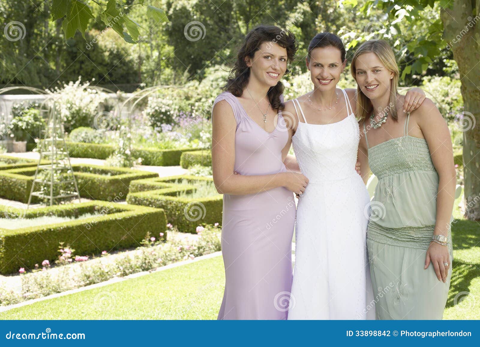 Happy Bride With Friends In Garden Stock Photo Image Of Bride Newlywed