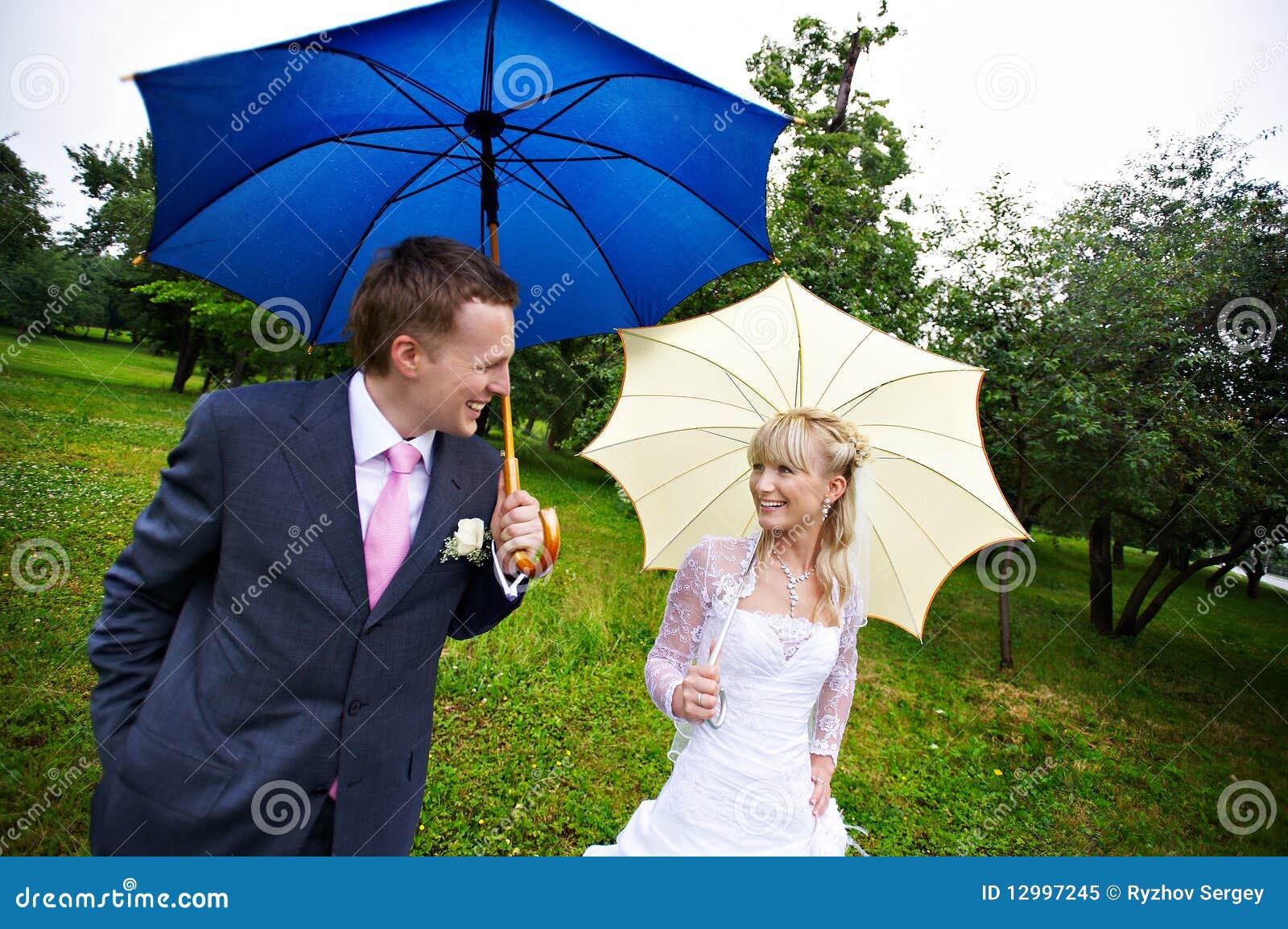 Happy Bride and Groom at Wedding with Umbrellas Stock Image Image of