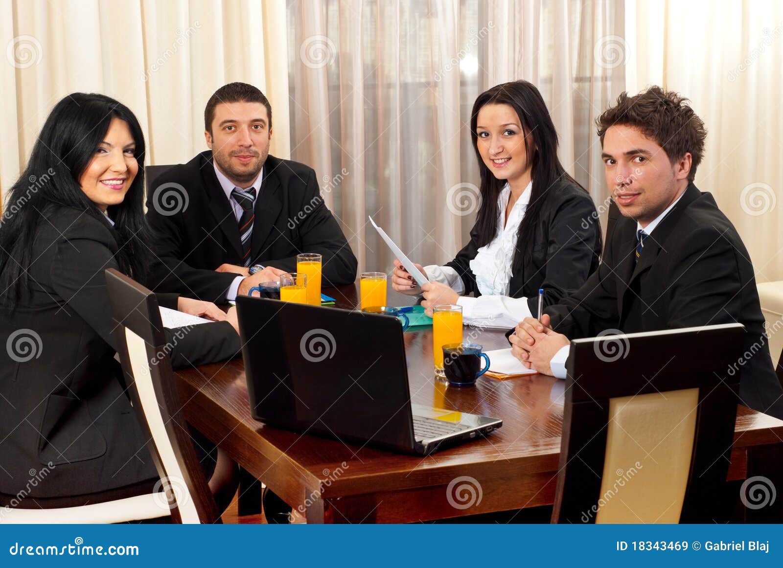 Happy Business People Around a Table at Meeting Stock Image Image of