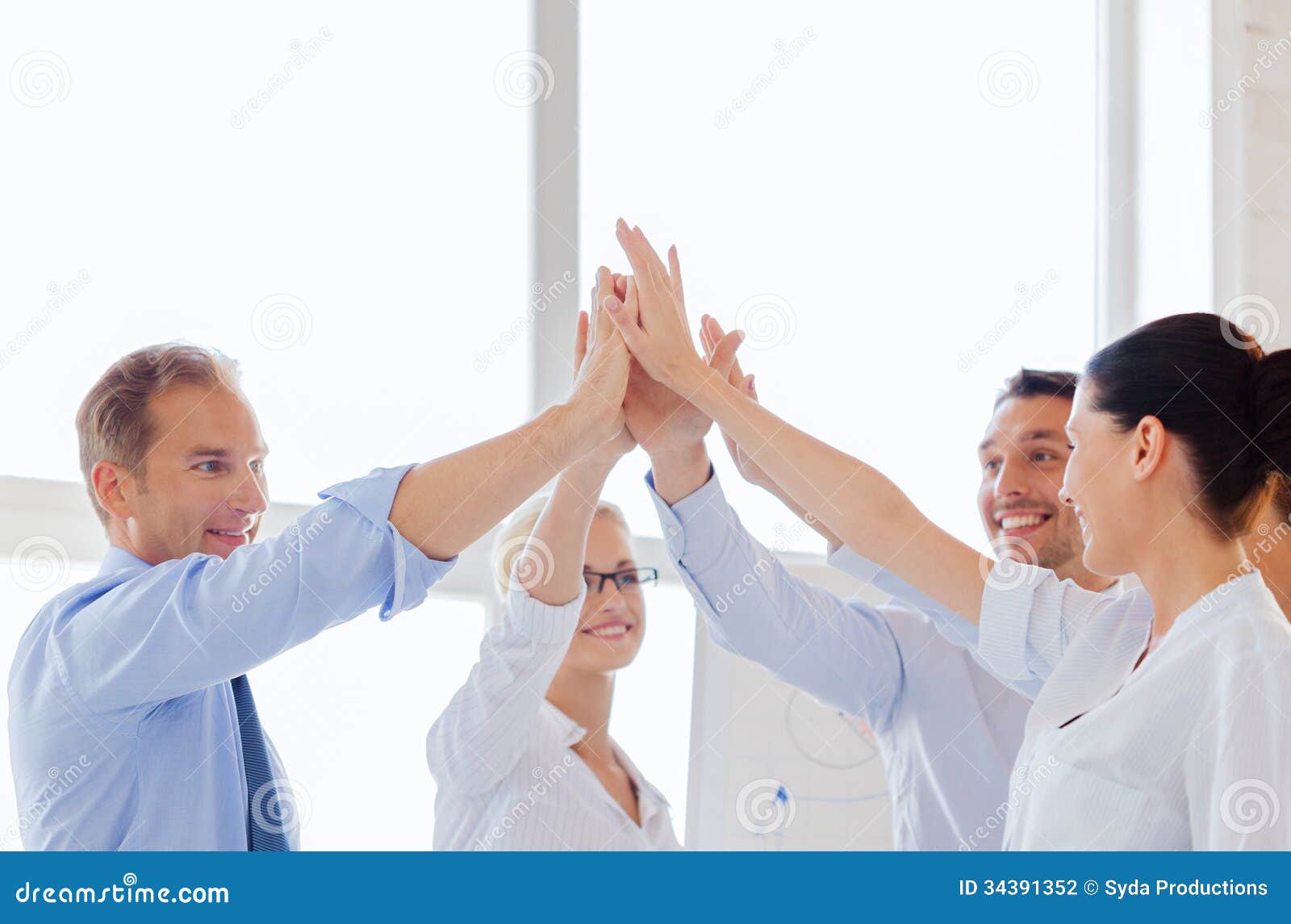 Happy Business Team Giving High Five In Office Stock Photo - Image of ... Office Team Celebration