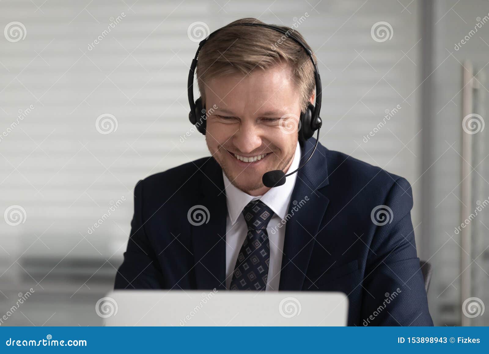 happy businessman wearing suit wireless headset make conference video call