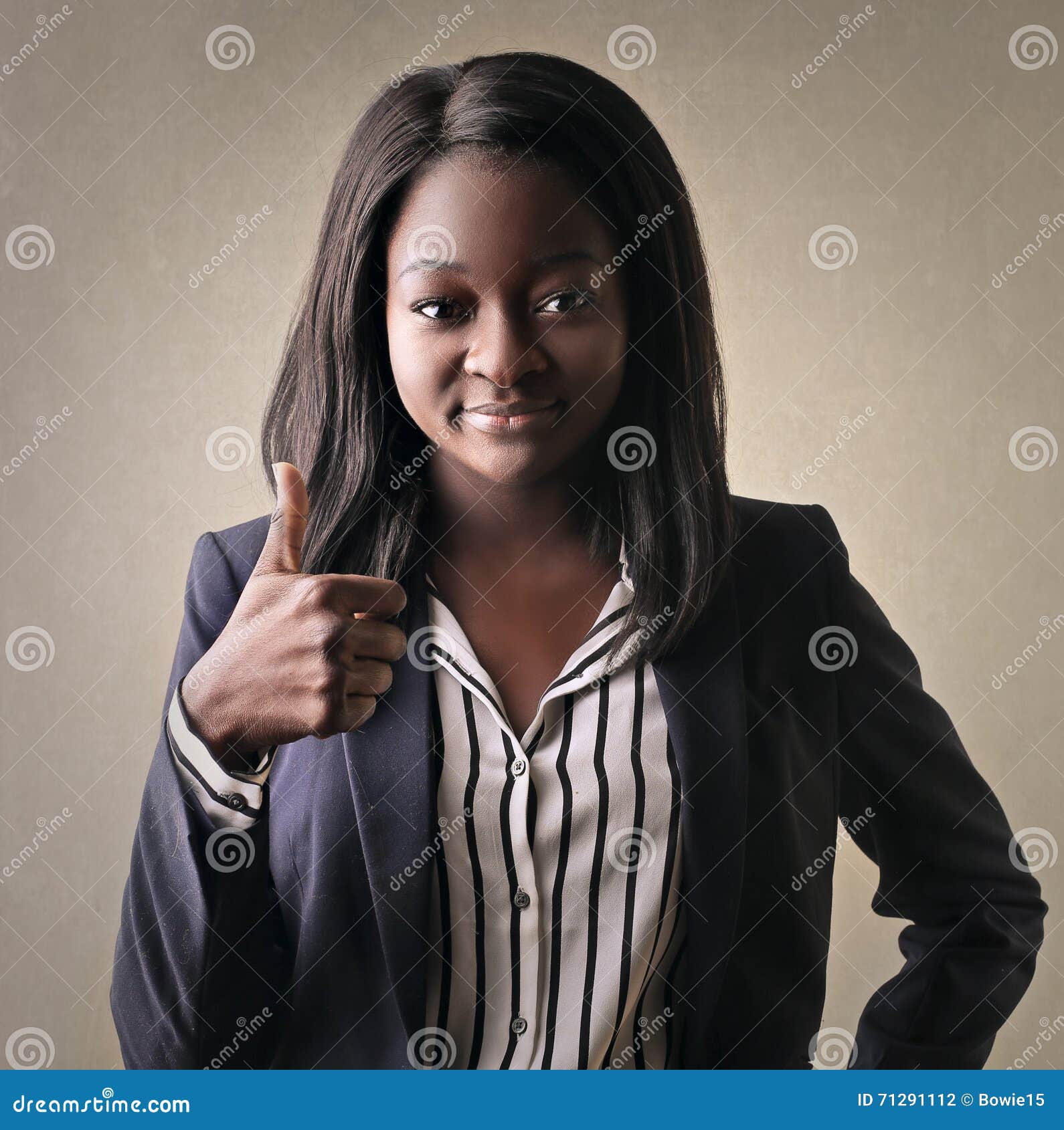 Happy businesswoman doing the ok sign