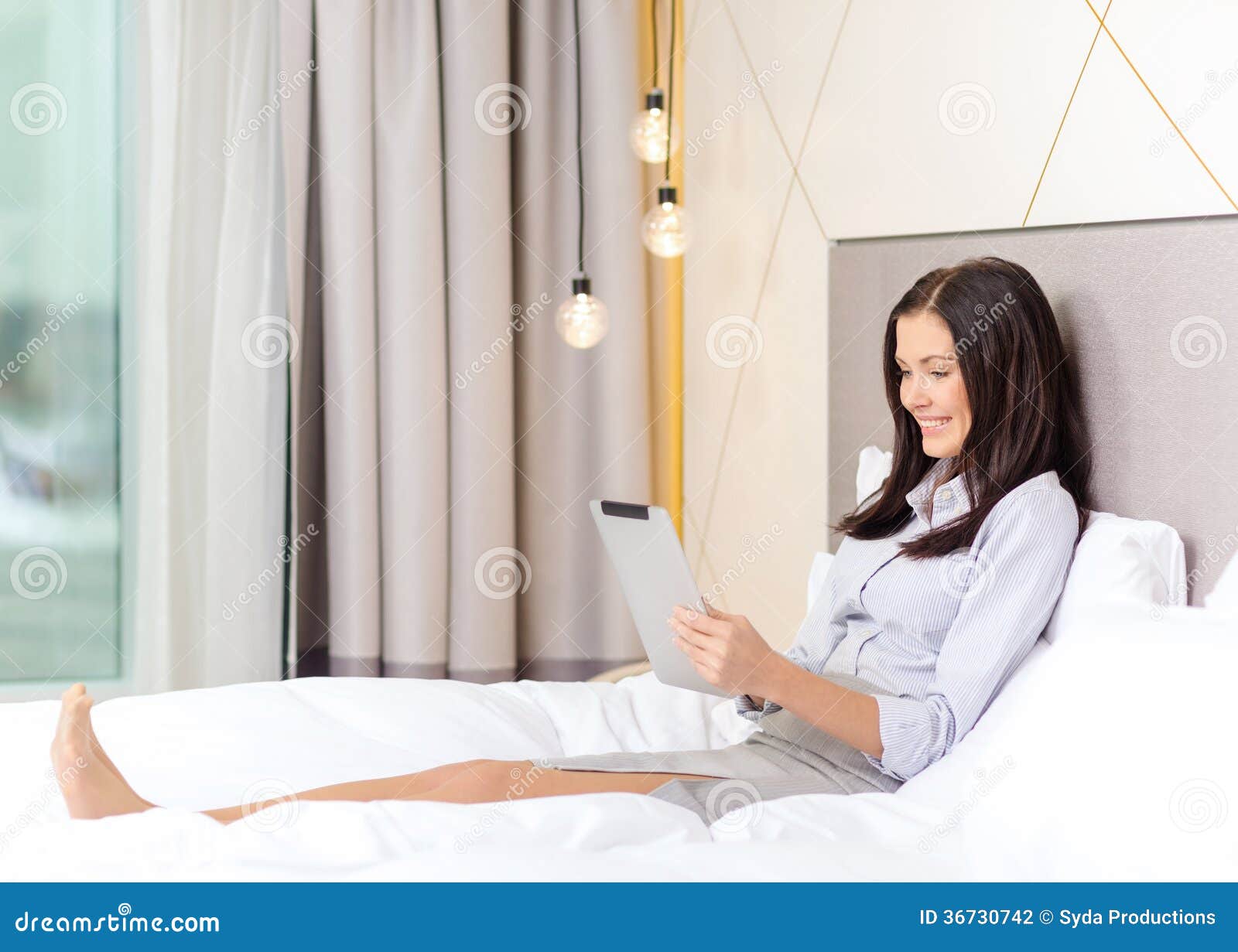 Happy Businesswoman With Tablet Pc In Hotel Room Stock ...