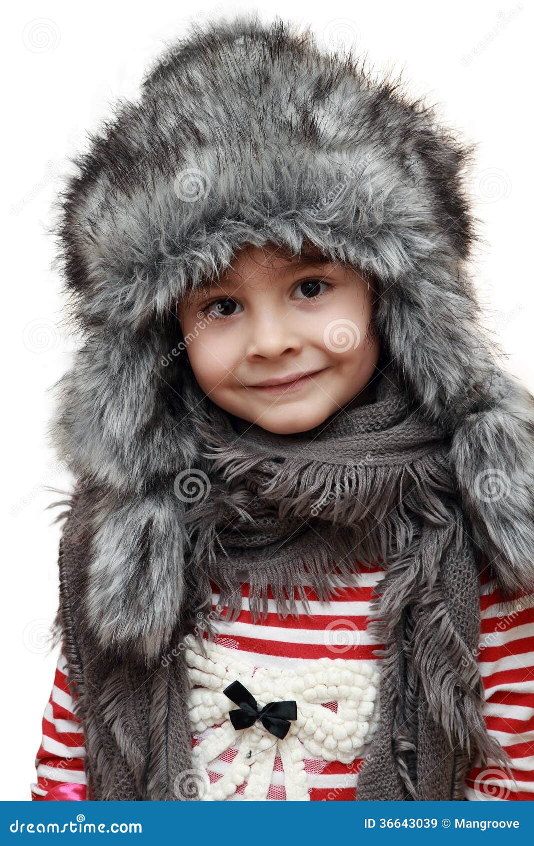 happy child with furry winter hat