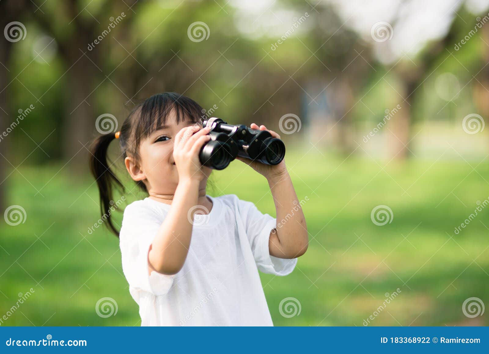 Happy Child Girl Playing with Binoculars. Explore and Adventure Concept Stock Photo Image of