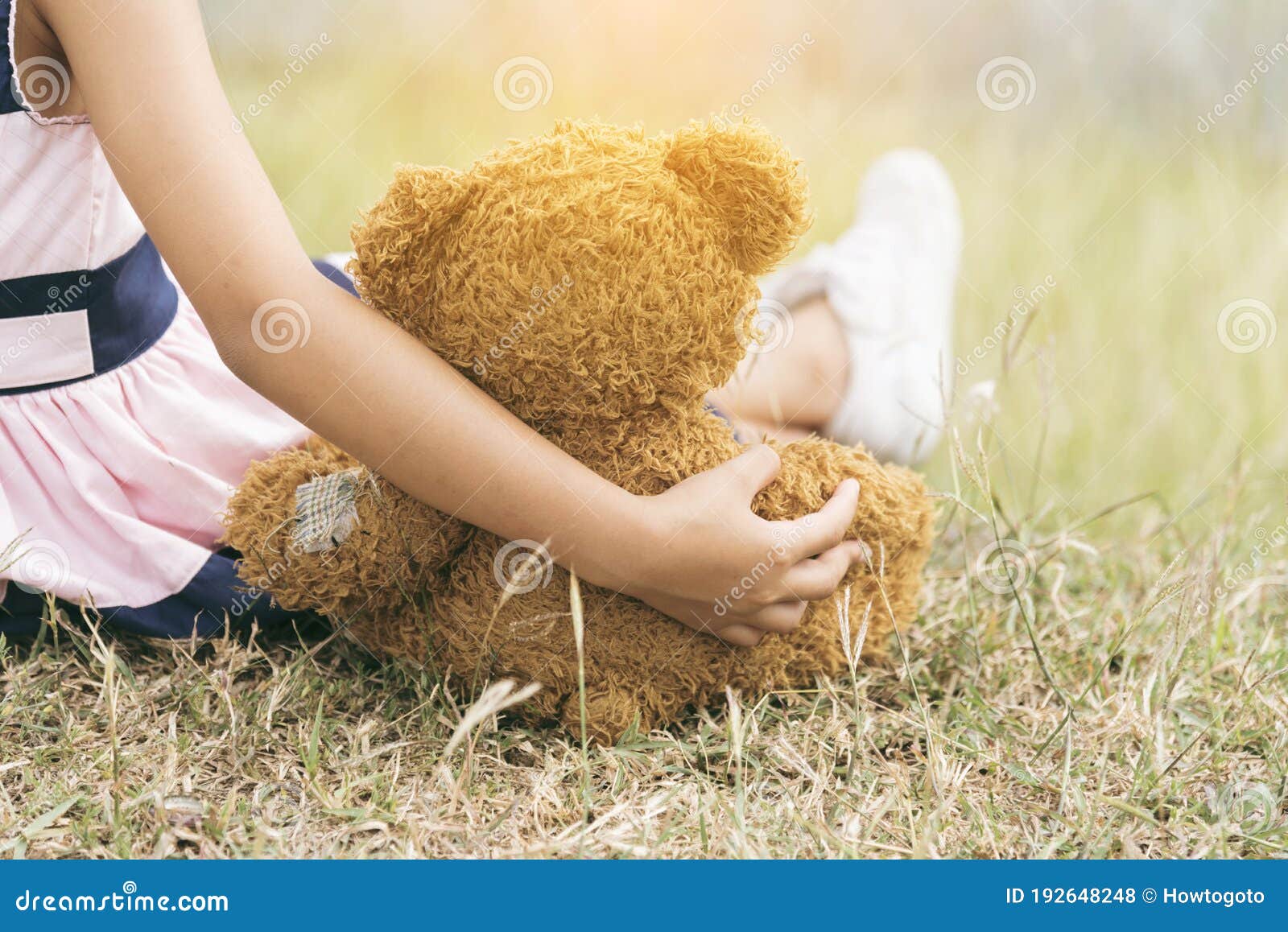 Happy Child Hug Teddy Bear in Green Park Playground. Teddy Bear ...