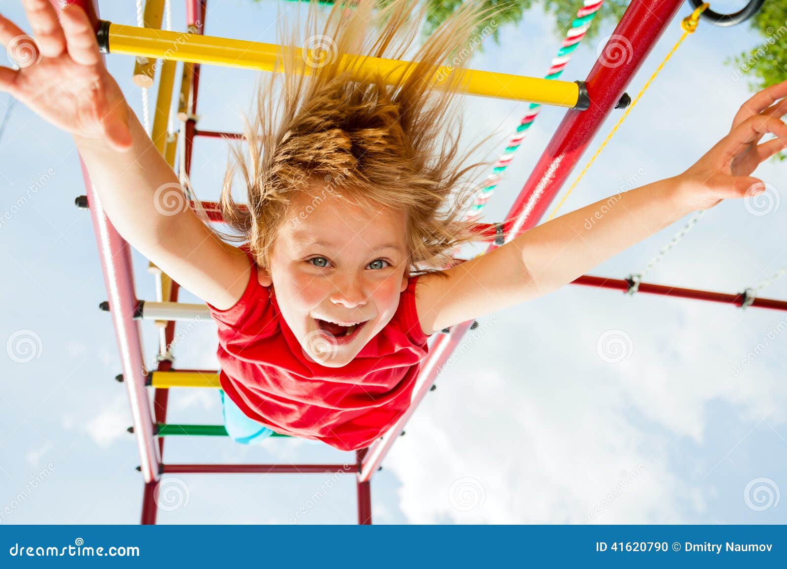 Happy Child on a Jungle Gym Stock Photo - Image of gripping, hang: 41620790