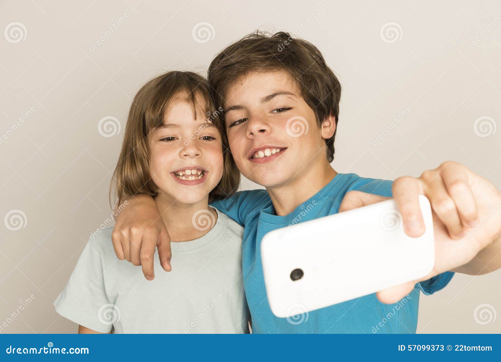 Happy child take a selfie stock image. Image of brown - 57099373