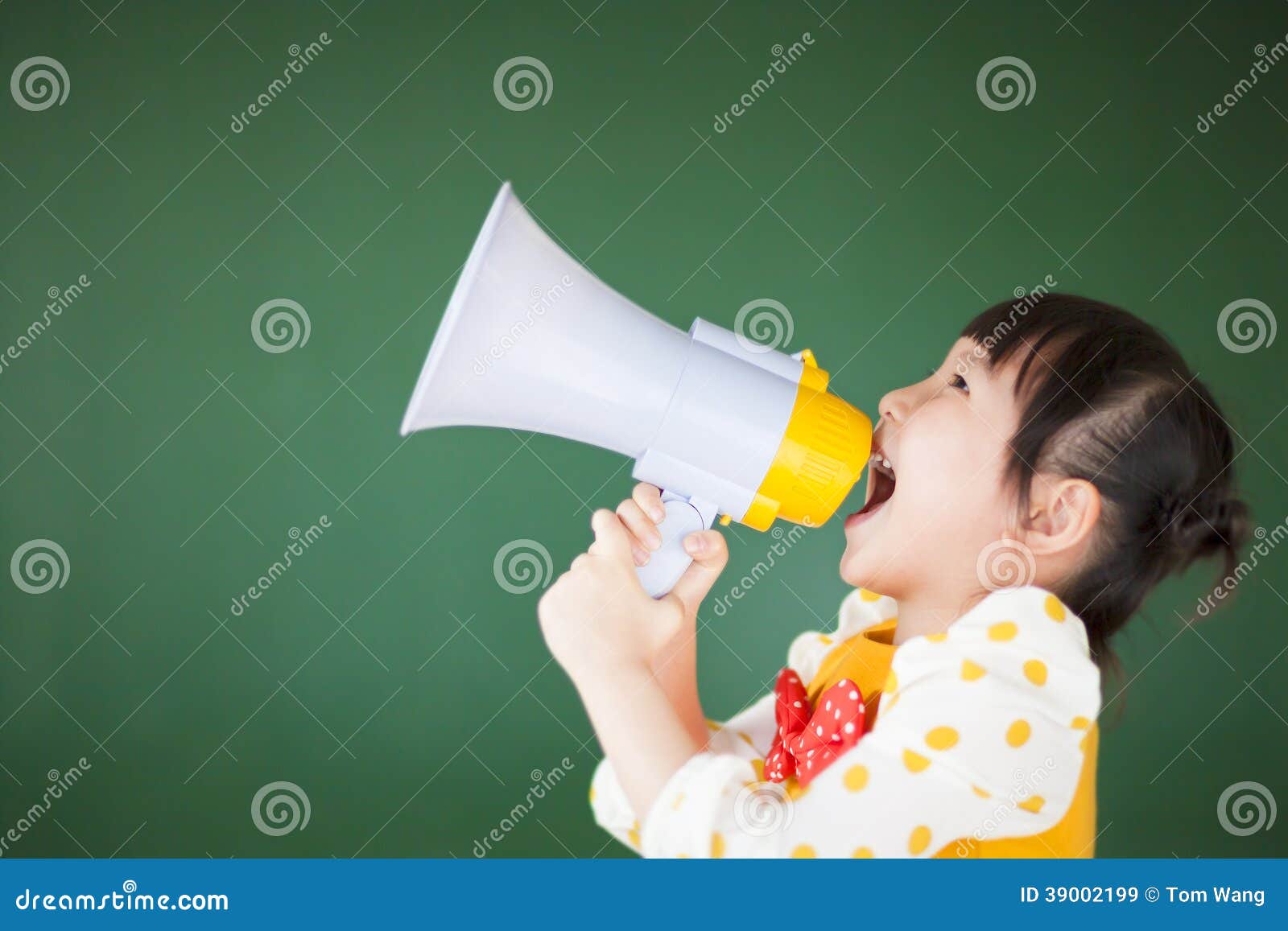 happy child using a megaphone