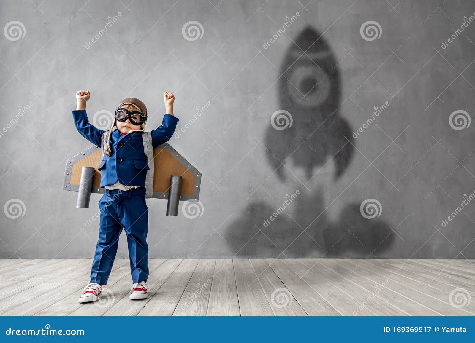 happy child wants to fly. imagination, freedom and motivation concept