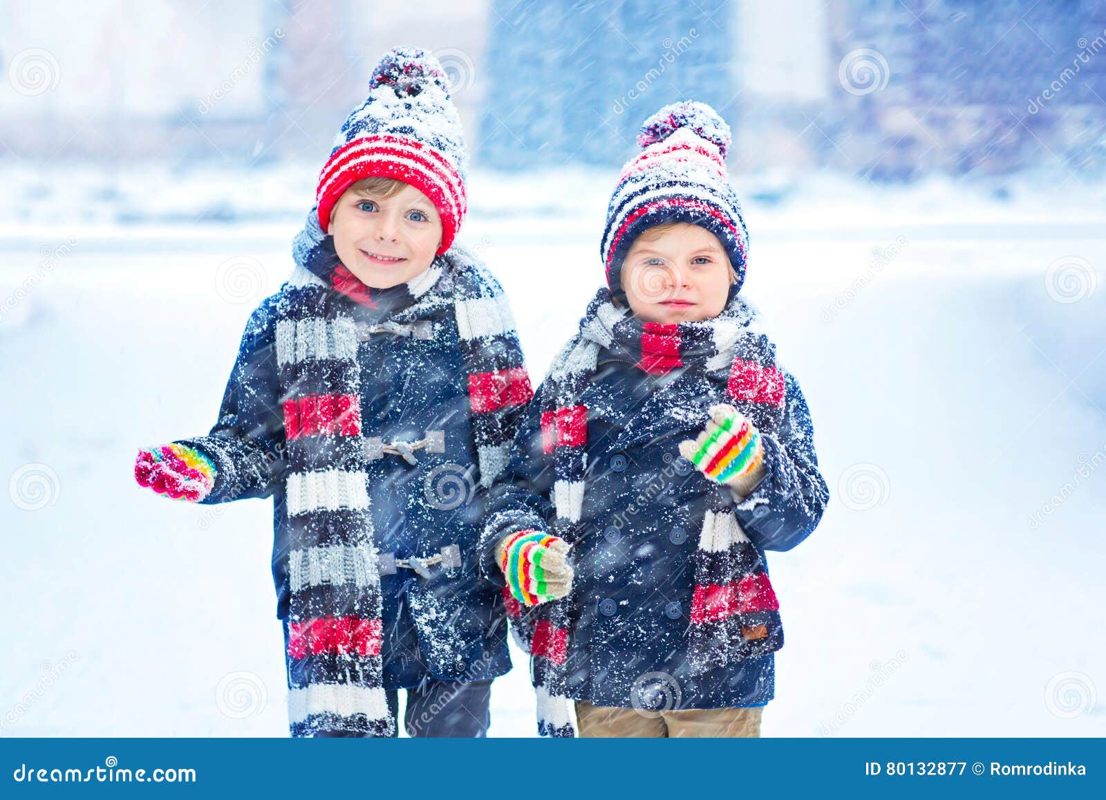 Boy In A Cold Winter Day Outdoors In Warm Clothes Stock Photo, Picture and  Royalty Free Image. Image 25442133.