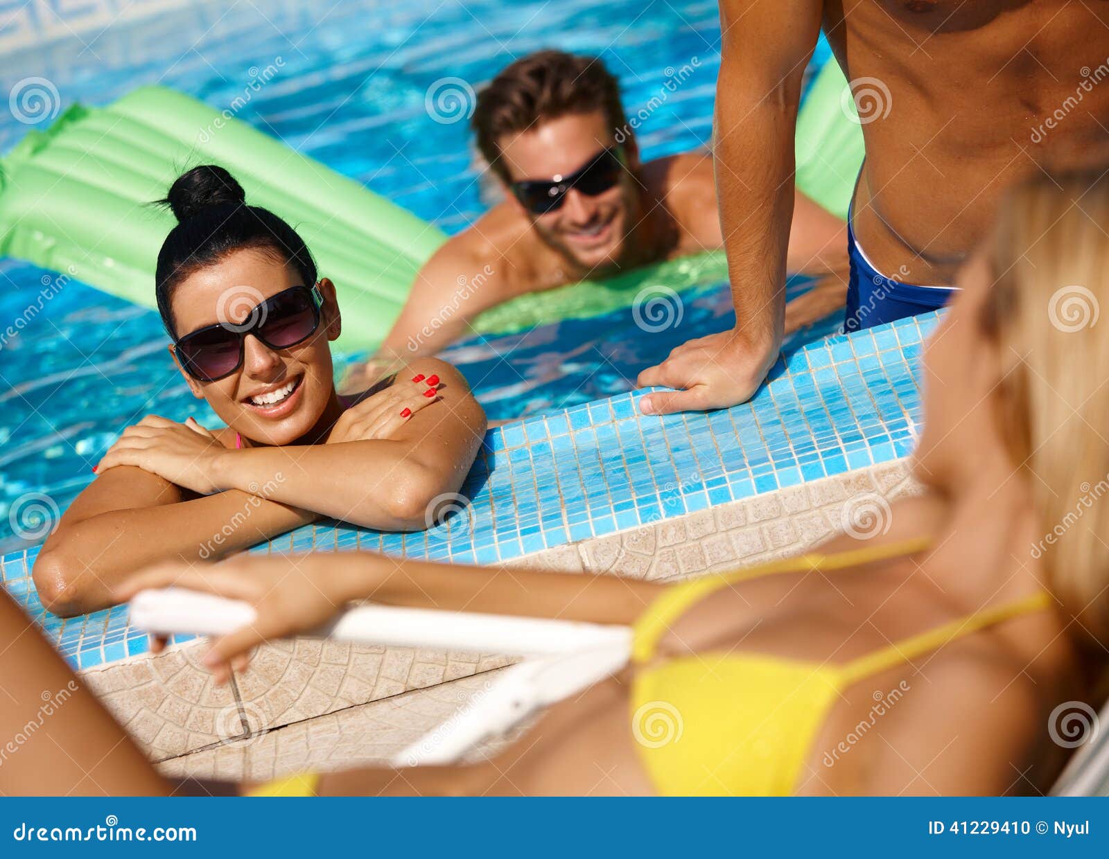 happy companionship in swimming pool