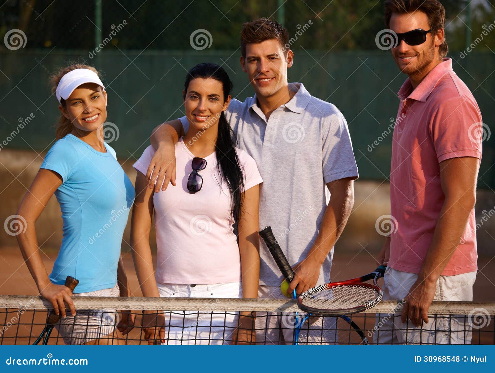 happy companionship on tennis court