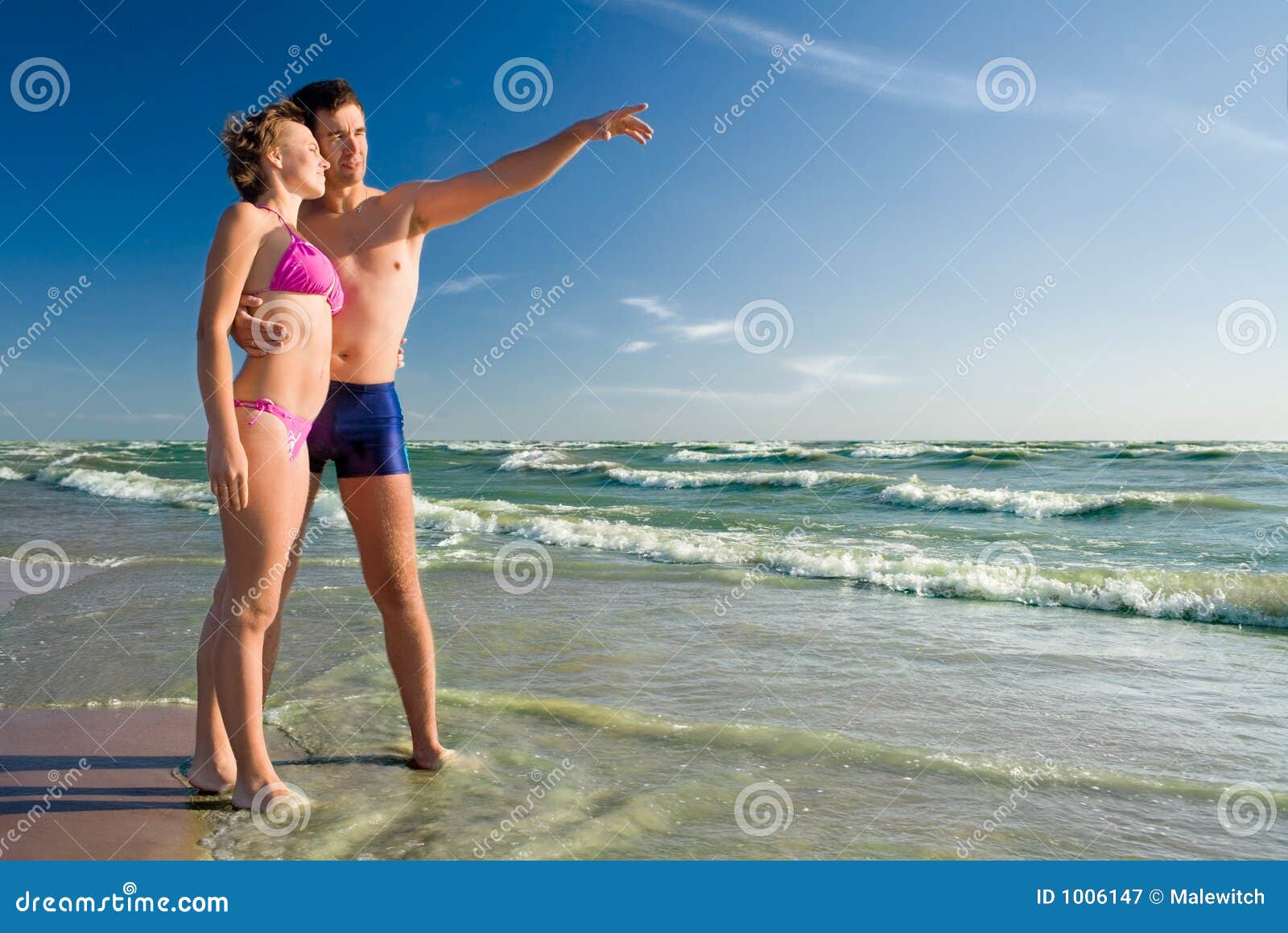 Happy couple on a beach-3 stock image photo pic