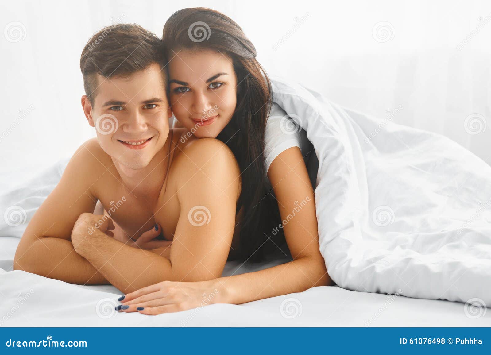 Happy Couple In Bed Stock Photo Image Of Happy Attractive 61076498