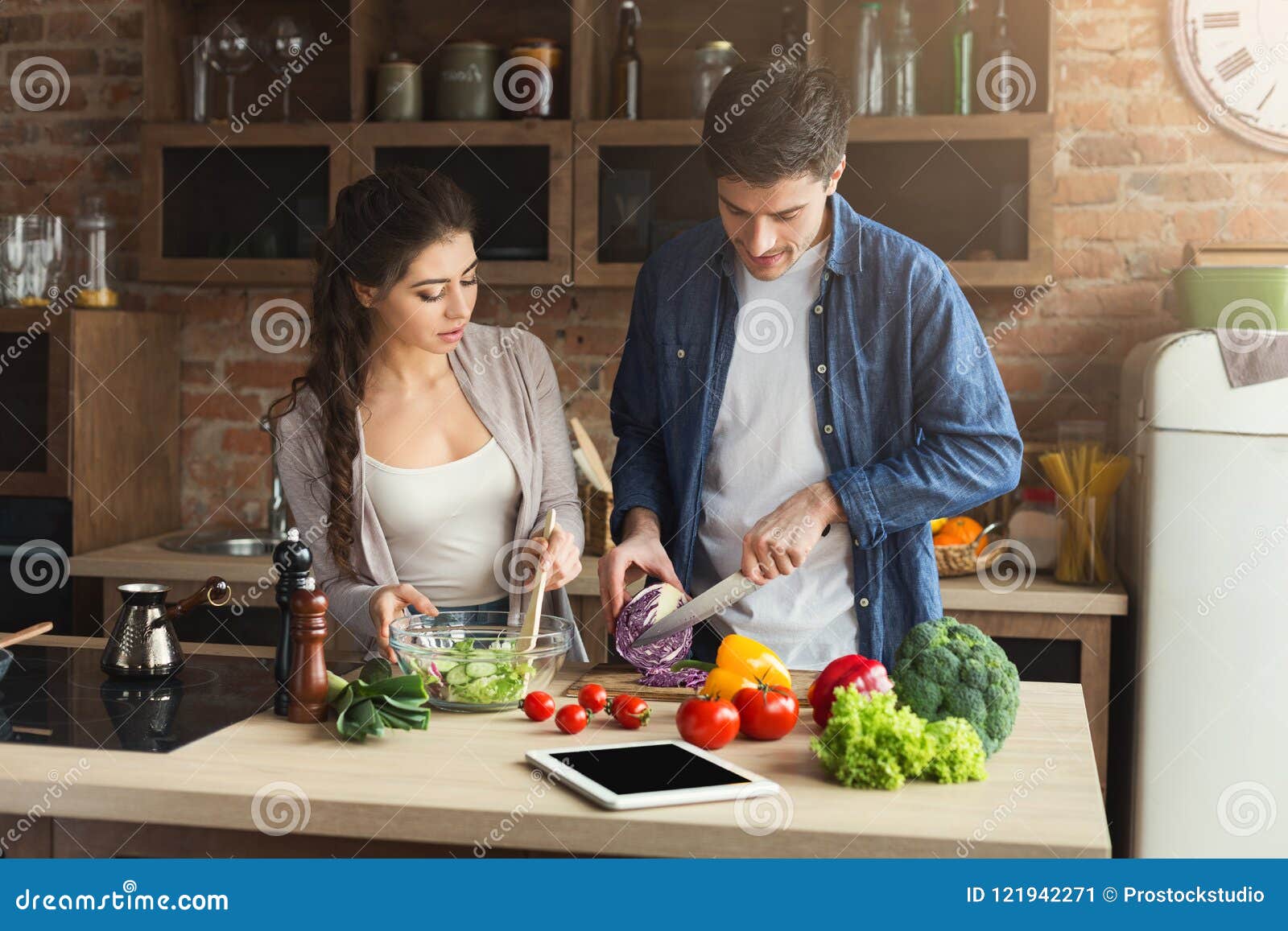 Happy Couple Cooking Healthy Food Together Stock Image - Image of male