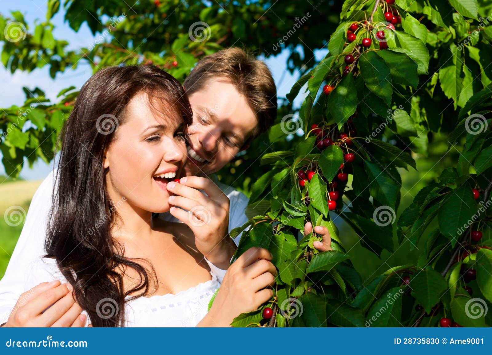 Happy Couple Eating Cherries in Summer Stock Photo Image of young