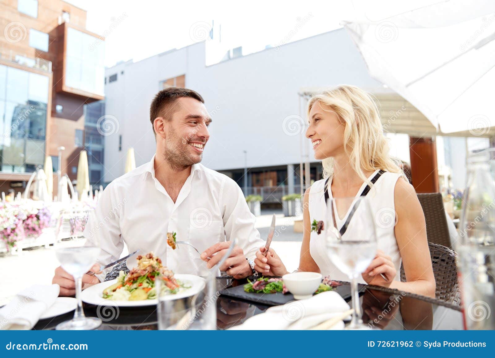 Happy Couple Eating Dinner At Restaurant Terrace Stock ... Happy Couple Eating