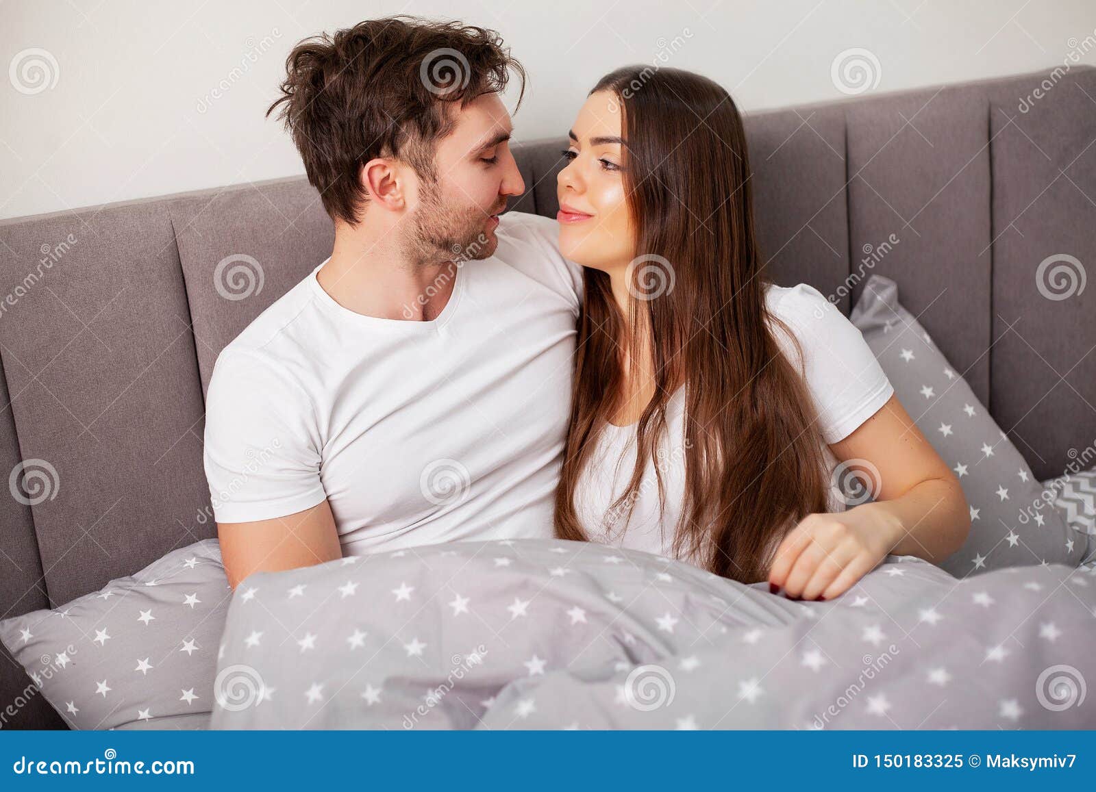 Happy Couple Having Fun In Bed Intimate Sensual Young Couple In