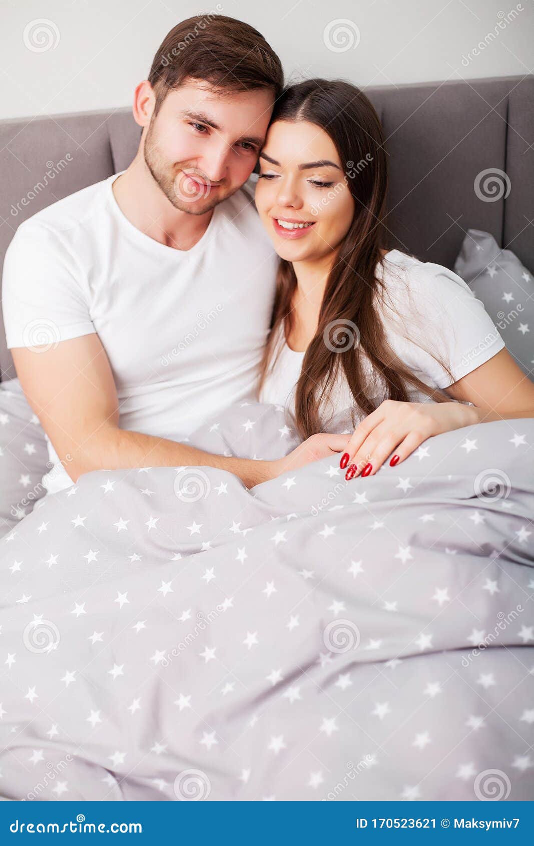 Happy Couple Having Fun In Bed Intimate Sensual Young Couple In Bedroom Enjoying Each Other