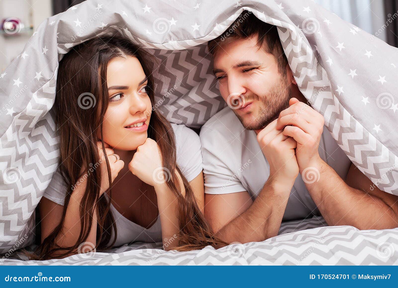 Happy Couple Having Fun In Bed Intimate Sensual Young Couple In Bedroom Enjoying Each Other