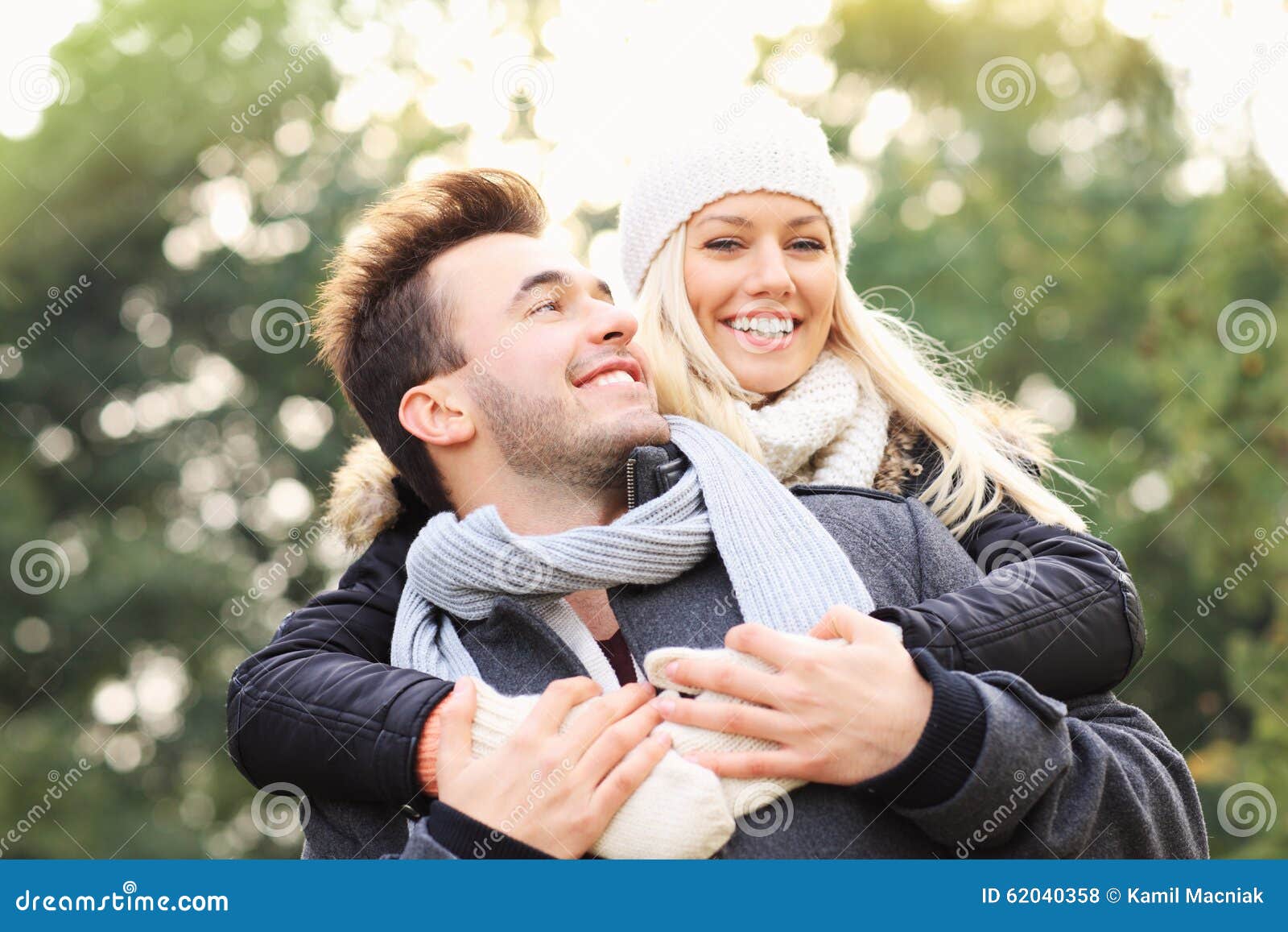 Happy Couple Having Fun On A Date In The Park Stock Photo Image Of