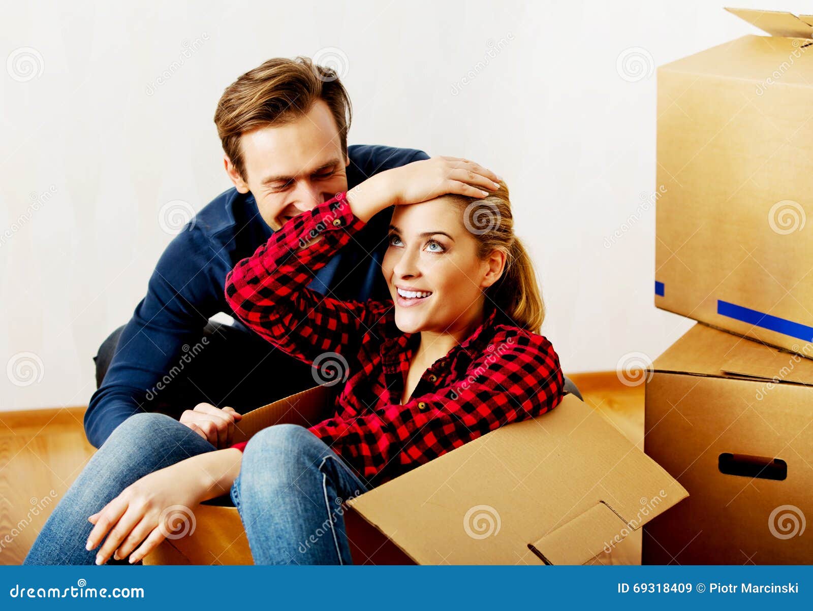 Happy Couple Having Fun In New Home Stock Image Image Of Playing