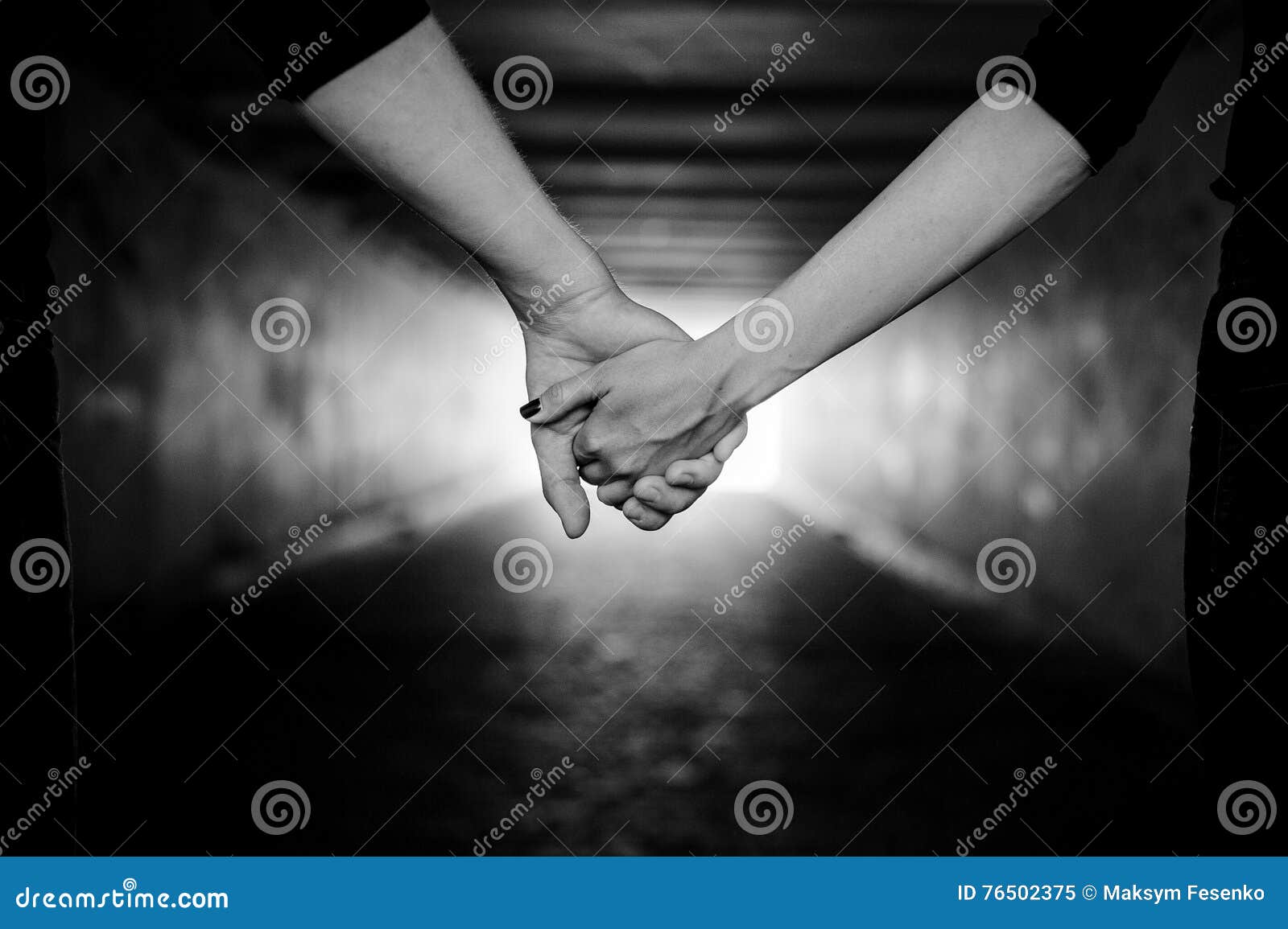 Happy couple holding hands stock image. Image of color 76502375