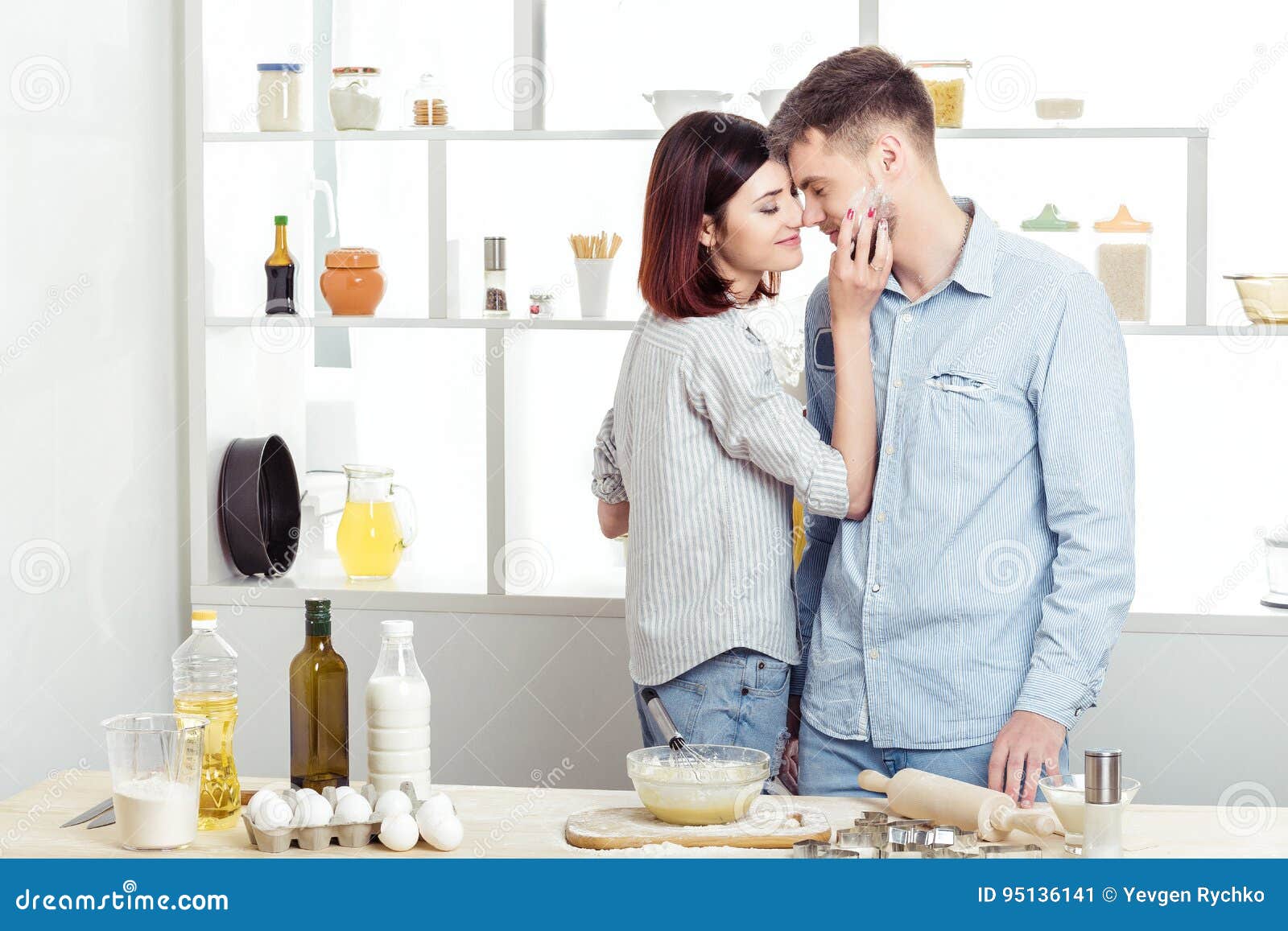 The Lovers Getting Hot In The Kitchen Happy Couple in Love Cooking Dough and Kissing in Kitchen Stock Image