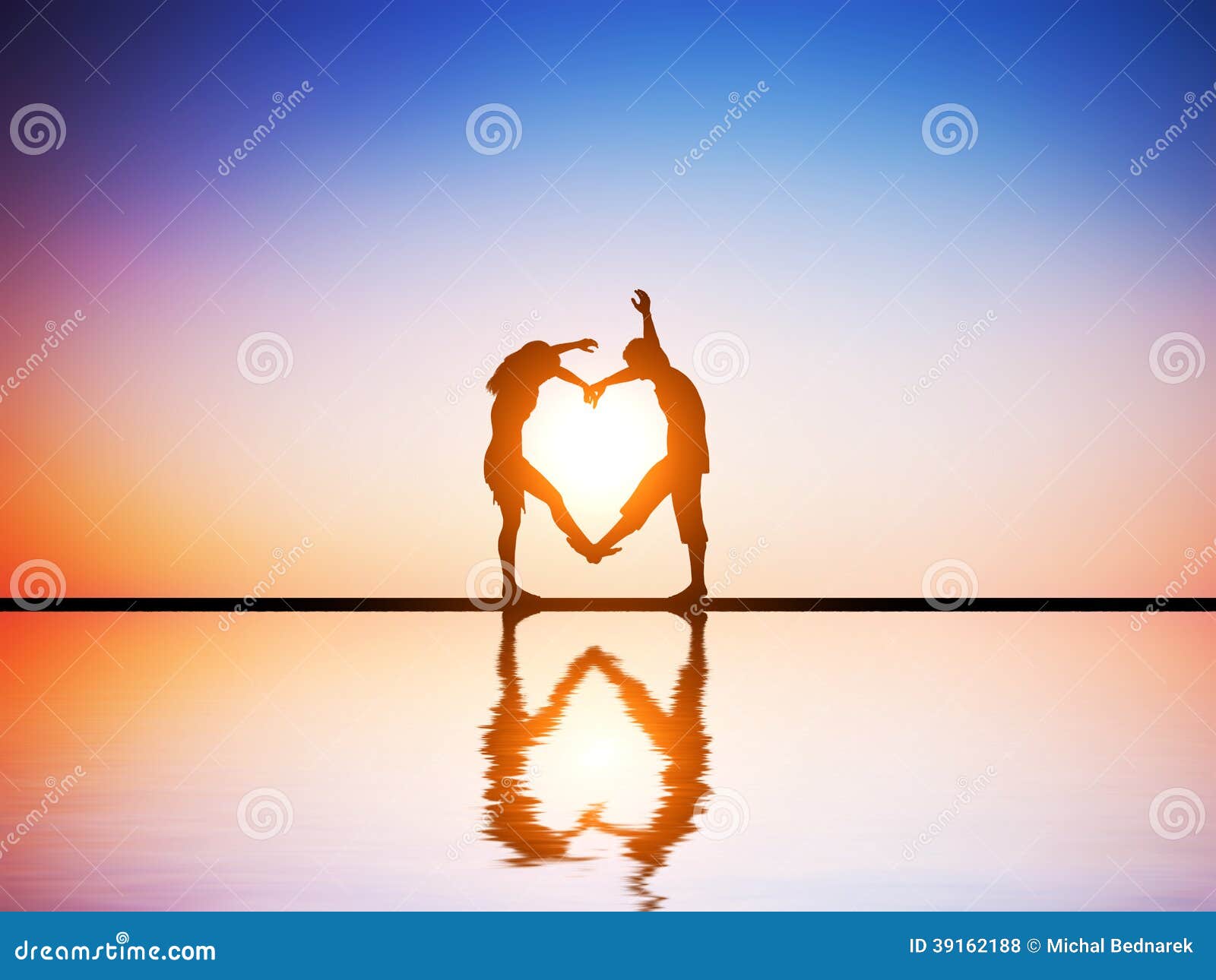 a happy couple in love making a heart 