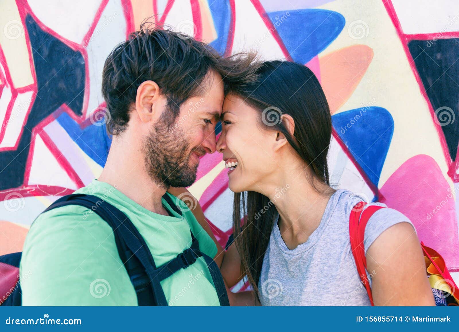 Happy Couple In Love Taking A Selfie Doing Funny Kissing Pose At