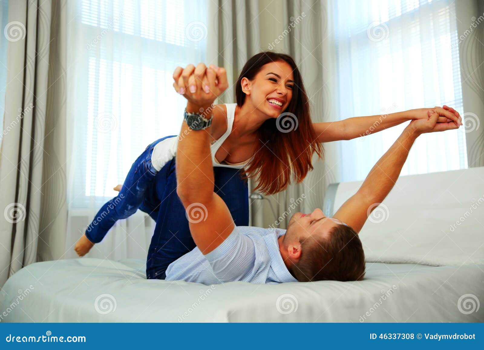 couple playing in bed