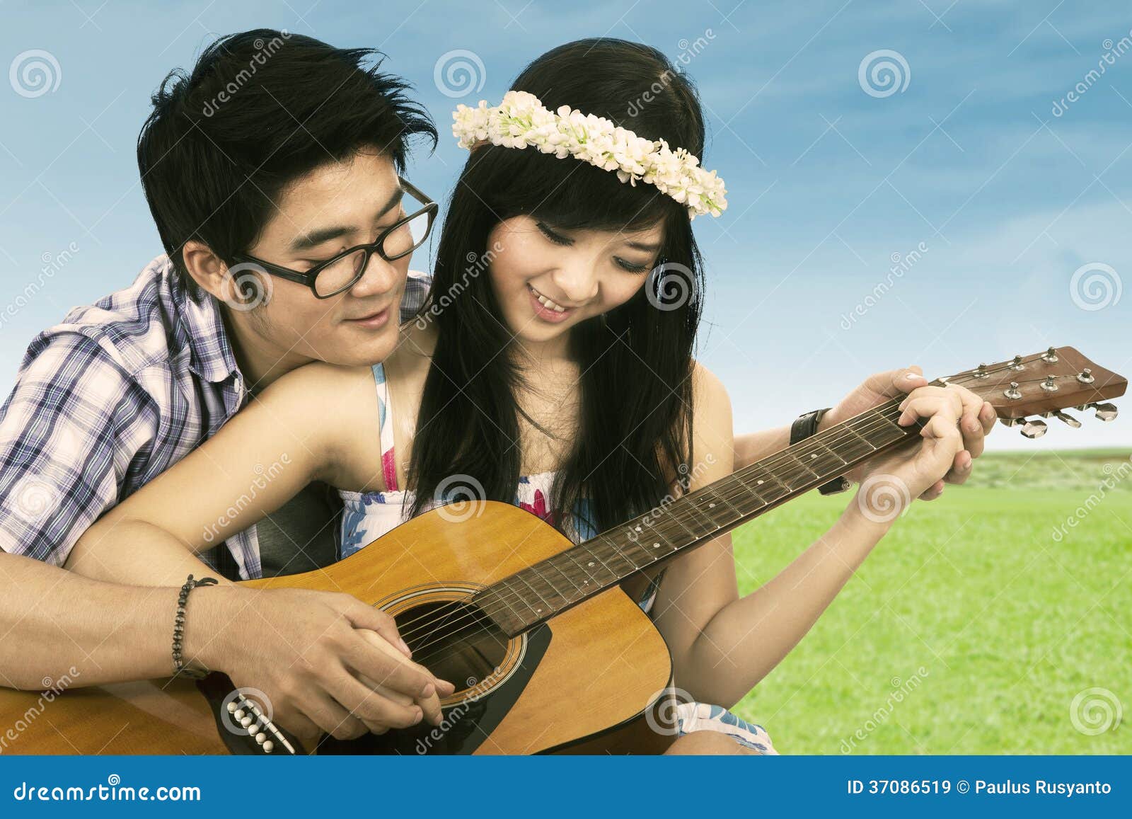 Happy Couple  Playing Guitar  Stock Image Image 37086519
