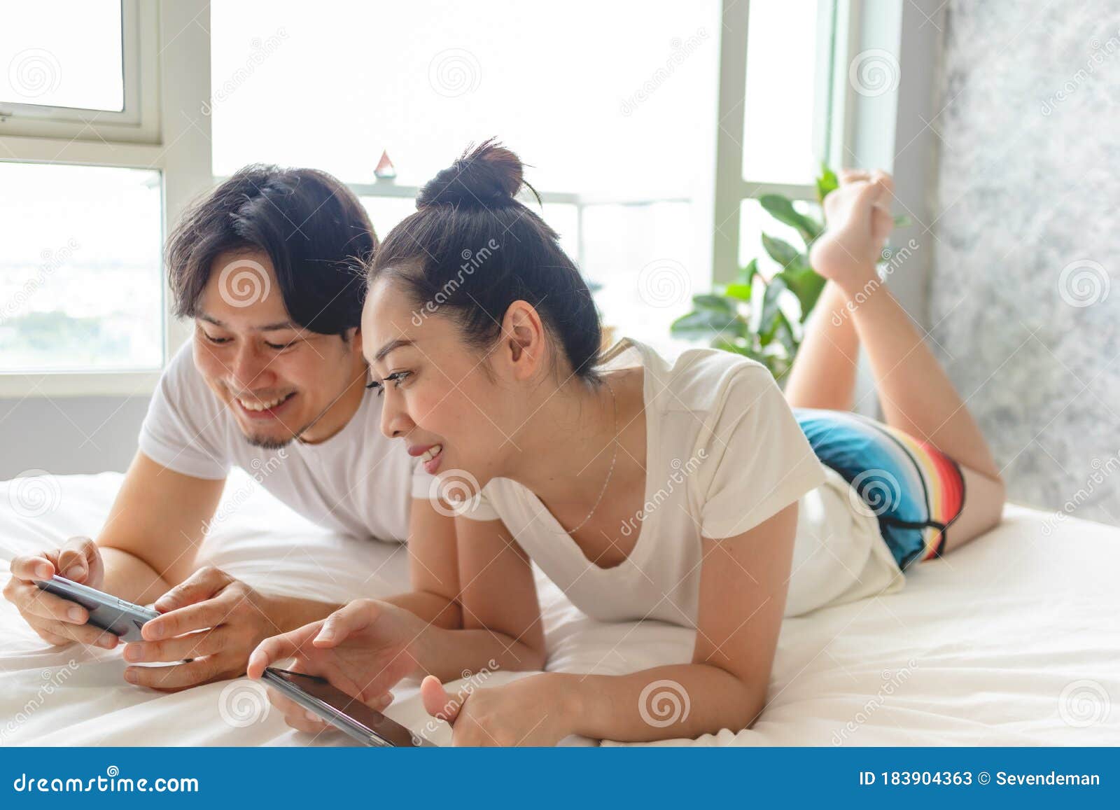 couple playing in bed