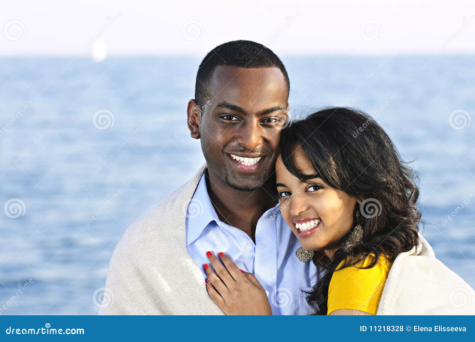 Happy Couple Sharing Blanket Stock Photo Image of outside, black