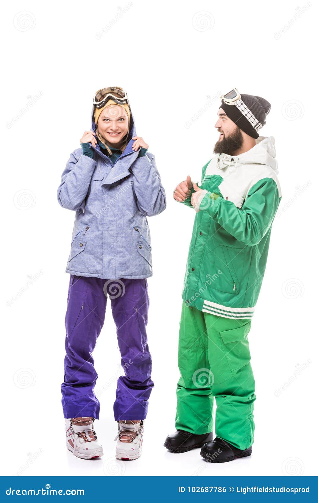 Happy Couple in Snowboarding Costumes Stock Photo - Image of hats ...