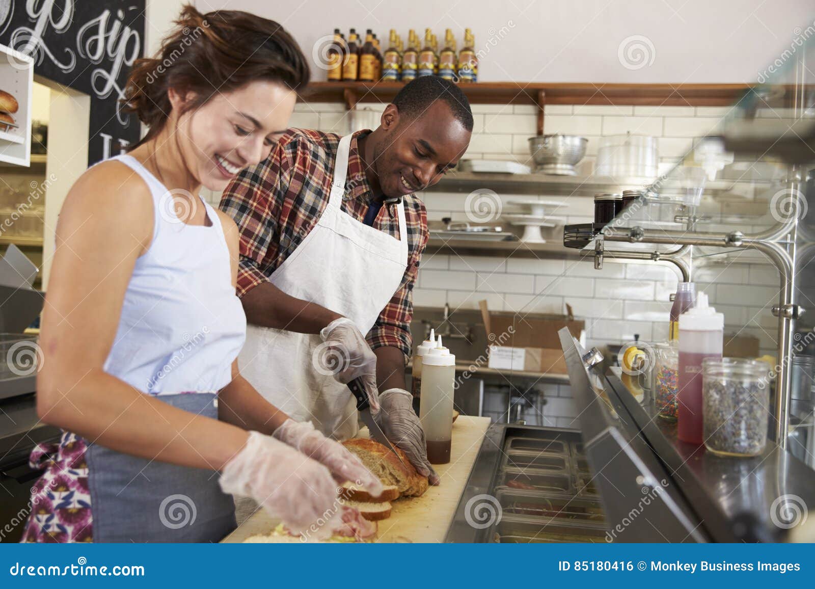 Woman Working Behind The Counter At A Sandwich Bar Stock Photo - Download  Image Now - Sandwich, Bar Counter, Store - iStock
