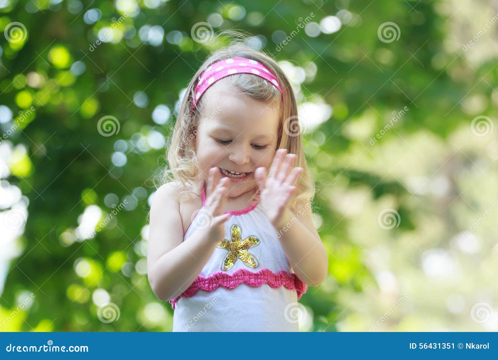 Happy Curly Toddler Girl Clapping with Her Palms Stock Image - Image of ...