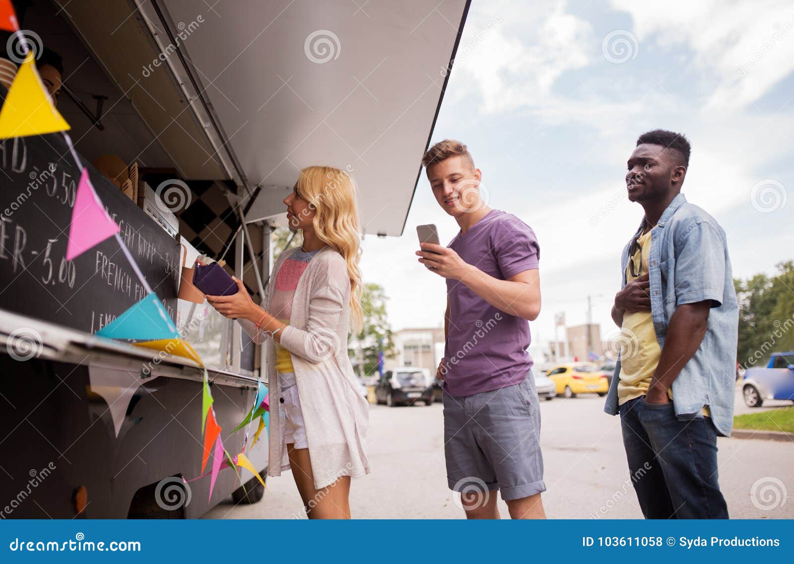 happy customers queue at food truck