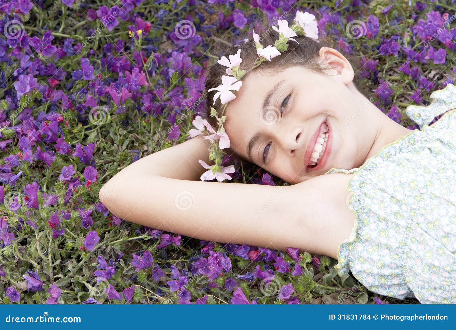 Happy Cute Girl Wearing Garland Crown Lying On Field Stock Images Image 31831784