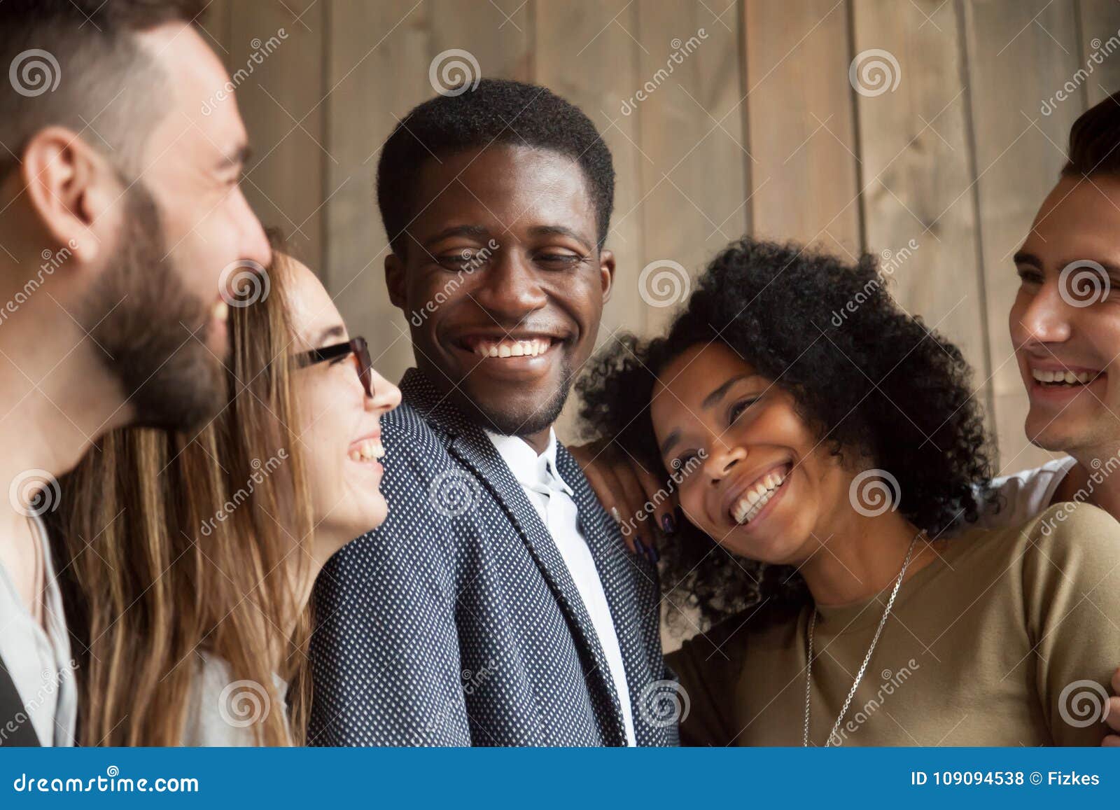 happy diverse black and white people group smiling bonding toget