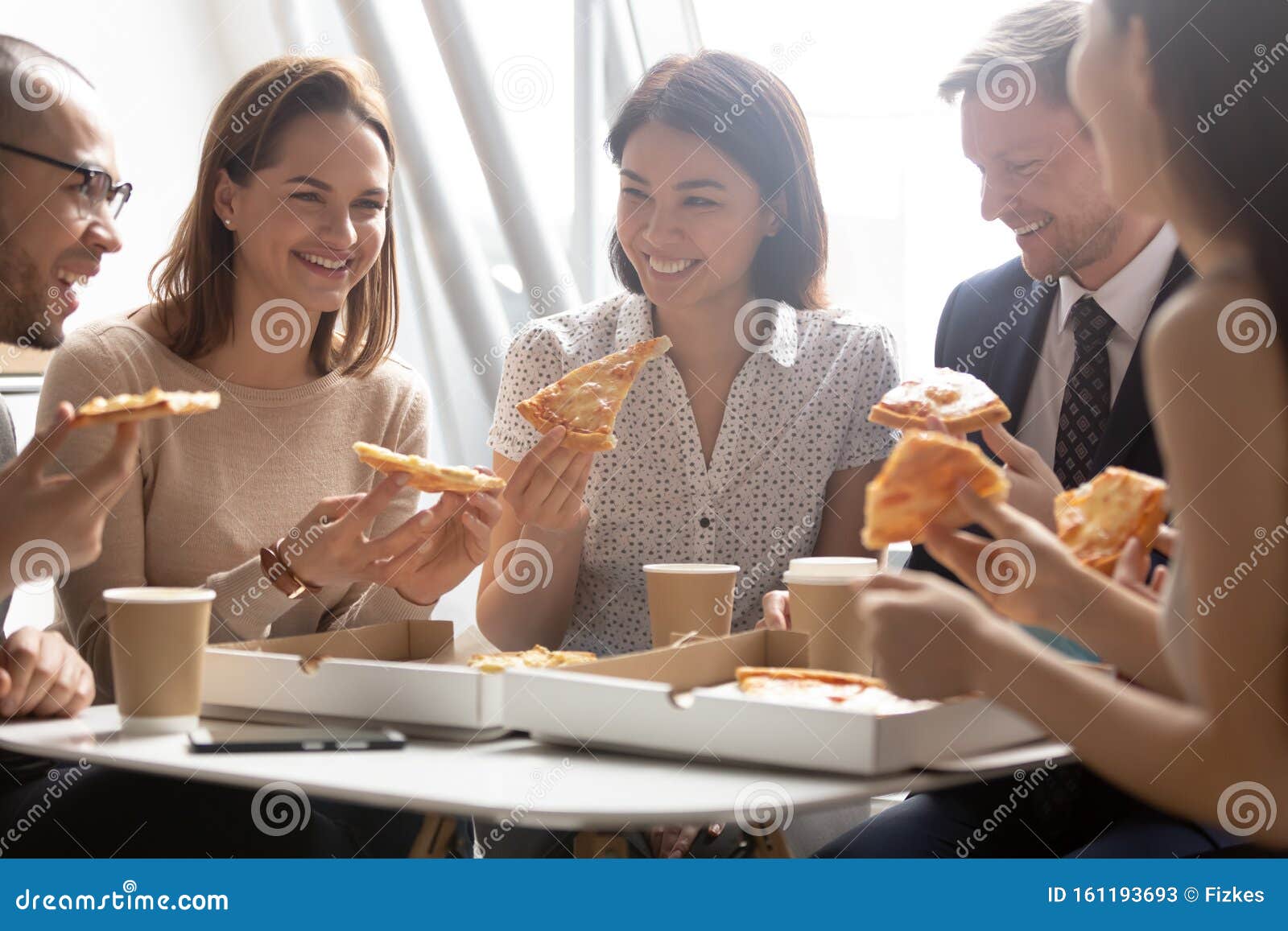 Happy Diverse Employees Enjoying Pizza, Having Fun during Break ... Office Team Celebration
